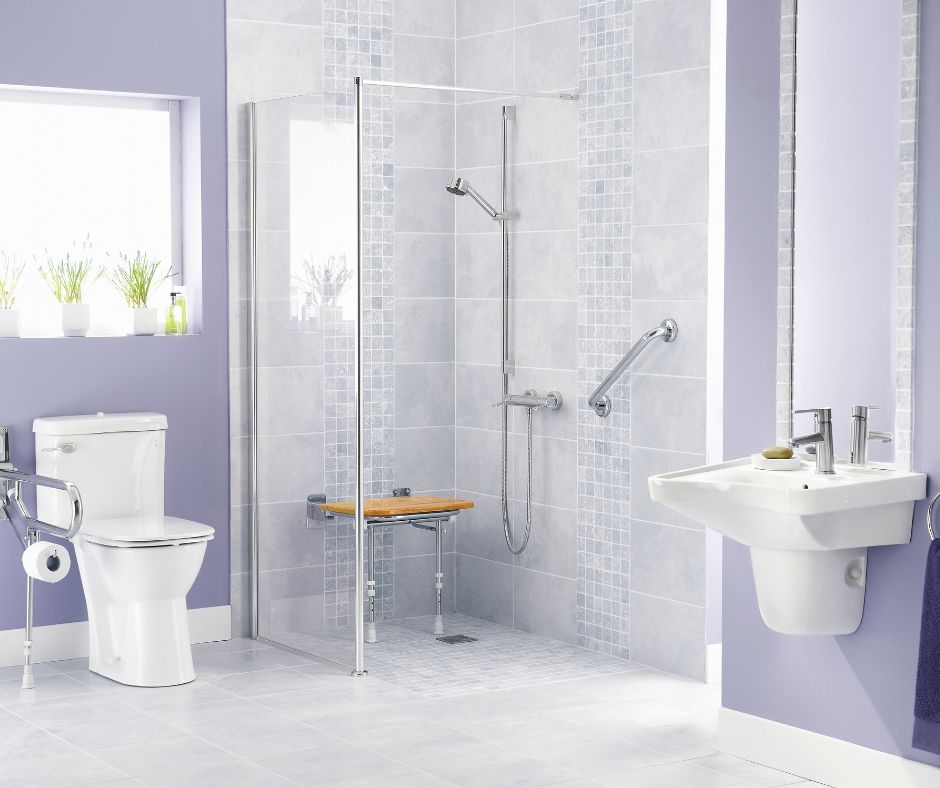 Disabled shower with low sinks and toilet and a shower with a seat and rails